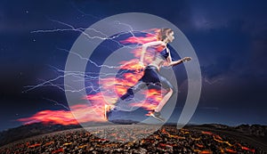 Woman running fast against stormy sky with flash