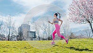 Woman running fast for sport on sunny day