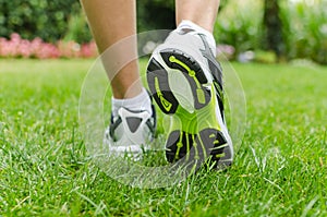 Woman running on grass