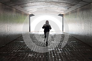 Woman Running Inside a Tunnel