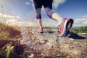 Woman running outdoor cross-country concept for exercising, fitness and healthy lifestyle