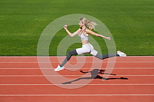 Woman running during. Sport backgrounds. Runner. Professional sportswoman during running training session. Woman running
