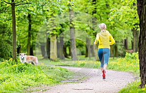 Woman running in summer park