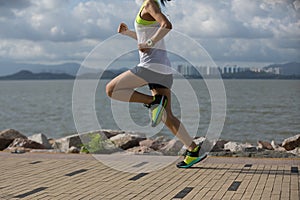 woman running on sunny coast