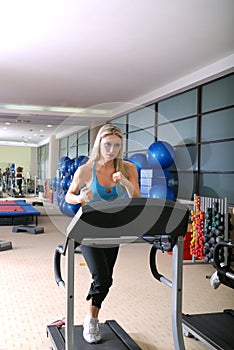 Woman running on treadmill