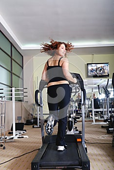Woman running on treadmill