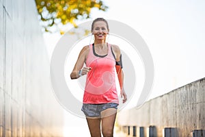 Woman running in urban area