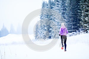 Woman running in winter, fitness inspiration and motivation