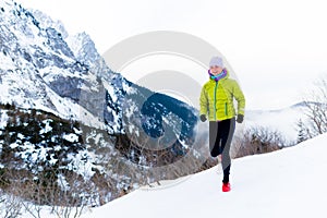 Woman running in winter, fitness inspiration and motivation