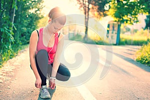 Woman running workout on spring sunny sunset