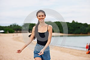 woman running young sand smile beach lifestyle summer sea travel sunset