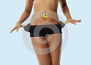 Woman& x27;s belly with drawing arrows. Fat lose, liposuction and cellulite removal concept. Good and fast metabolic problem.
