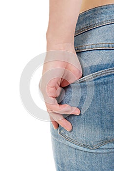 Woman's buttocks in jeans.