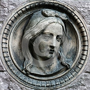 Woman's face on the wall