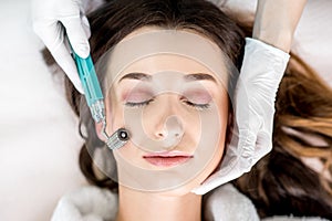 Woman`s facial treatment