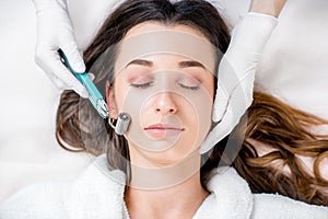 Woman`s facial treatment