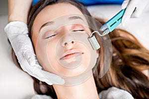 Woman`s facial treatment