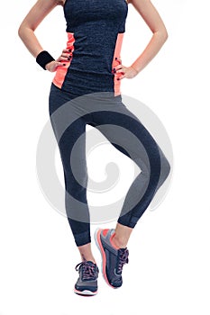 Woman`s fitness body in sports wear