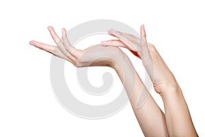 Woman`s hand is applying cream. body part