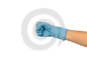Woman`s hand in a blue glove is clenched into a fist. Isolate on