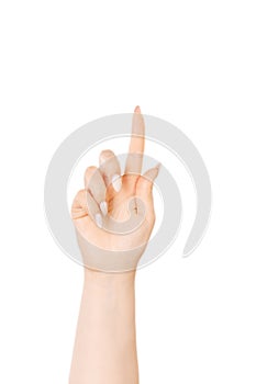 Woman`s hand is counting number 1 or One isolated on white background. The concept of hand symbols in counting numbers in order