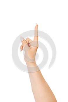 Woman`s hand is counting number 1 or One  on white background. The concept of hand symbols in counting numbers in order