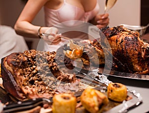 Woman's hand with fork and attractive bust