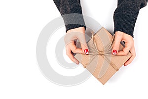 Woman`s hand with gift box