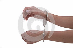 Woman`s hand with handcuffs