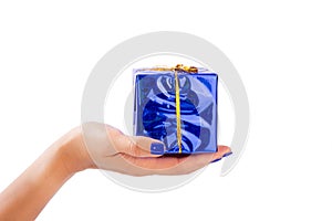 Woman's hand holding a big blue parcel