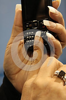 Woman's Hand Holding Cell Phone