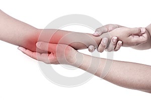 Woman's hand holding children's elbow. Elbow pain concept
