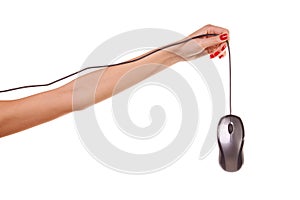 Woman's hand holding a computer mouse