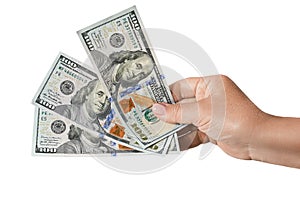 Woman& x27;s hand holds three bills 100 American dollar bill cash money isolated on white background.