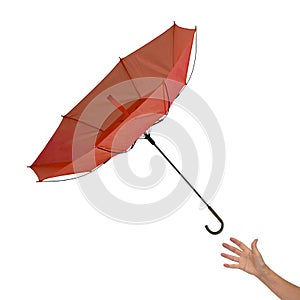 Woman& x27;s hand with inside out umbrella in gust of wind isolated on white.