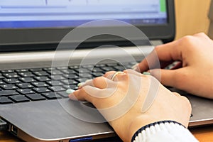 Woman`s hand on keyboard