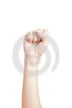 A woman`s hand lifted a thumbs up symbol fist Represents the fight isolated on white background and clipping path