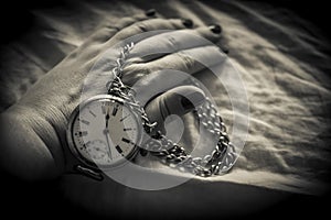 Woman`s Hand with an Old Pocket Watch