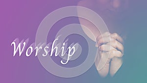 Woman`s hand praying and The word `Worship` and worship to GOD Using hands to pray in religious beliefs and worship Christian in