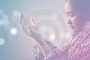 Woman`s hand praying and worship to GOD Using hands to pray in religious beliefs and worship christian in the church or in general