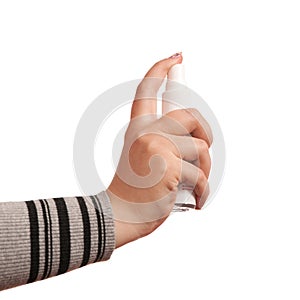 Woman's hand pressing aerosol