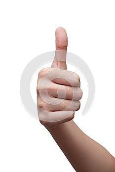 Woman`s hand showing thumbs up gesture. isolated on white background