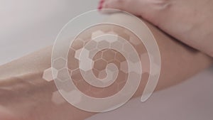 Woman`s Hand Strokes Smooth Healthy Skin. Stimulator of Body Tissue Regeneration
