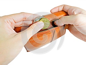 Woman`s hand taking australian coins from wallet with clipping