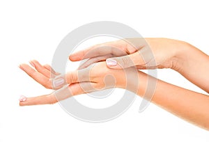 Woman's hands with care cream