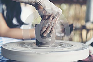 The woman's hands close up, the masterful studio of ceramics wor