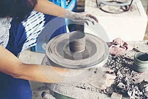 The woman's hands close up, the masterful studio of ceramics wor