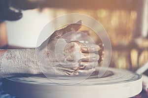 The woman's hands close up, the masterful studio of ceramics wor