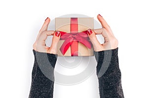 Woman`s hands with gift box