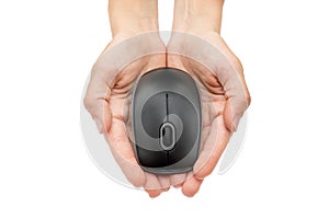 Woman's hands holding black computer mouse in palms isolated on white